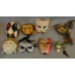 A collection of eight Venetian and other masks.