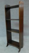 A mid 20th century set of oak floor standing open bookshelves. H.110 W.41 D.25cm