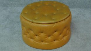 A 1960's vintage padded faux leather upholstered lidded stool. H.31 W.50 D.50cm