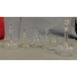 Five Cut Glass decanters and a lidded jar. Fine quality with original stoppers and hand cut