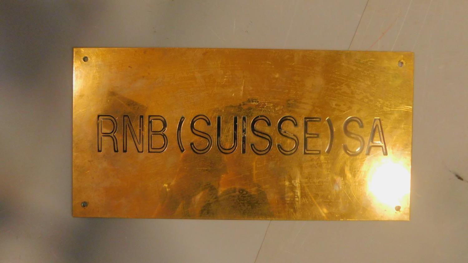 A collection of four miscellaneous brass wall plates. H.26cm W.42cm - Image 3 of 5