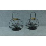 A pair of industrial style metal framed candle lanterns H.48cm W.41cm