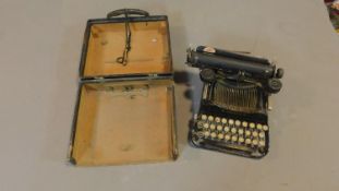 A Corona antique typewriter in carrying case.