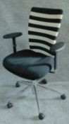 A Vitra swivel adjustable office desk chair on chromium castered base H.101cm