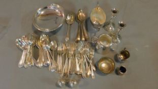 A collection of silver plated cutlery and other items