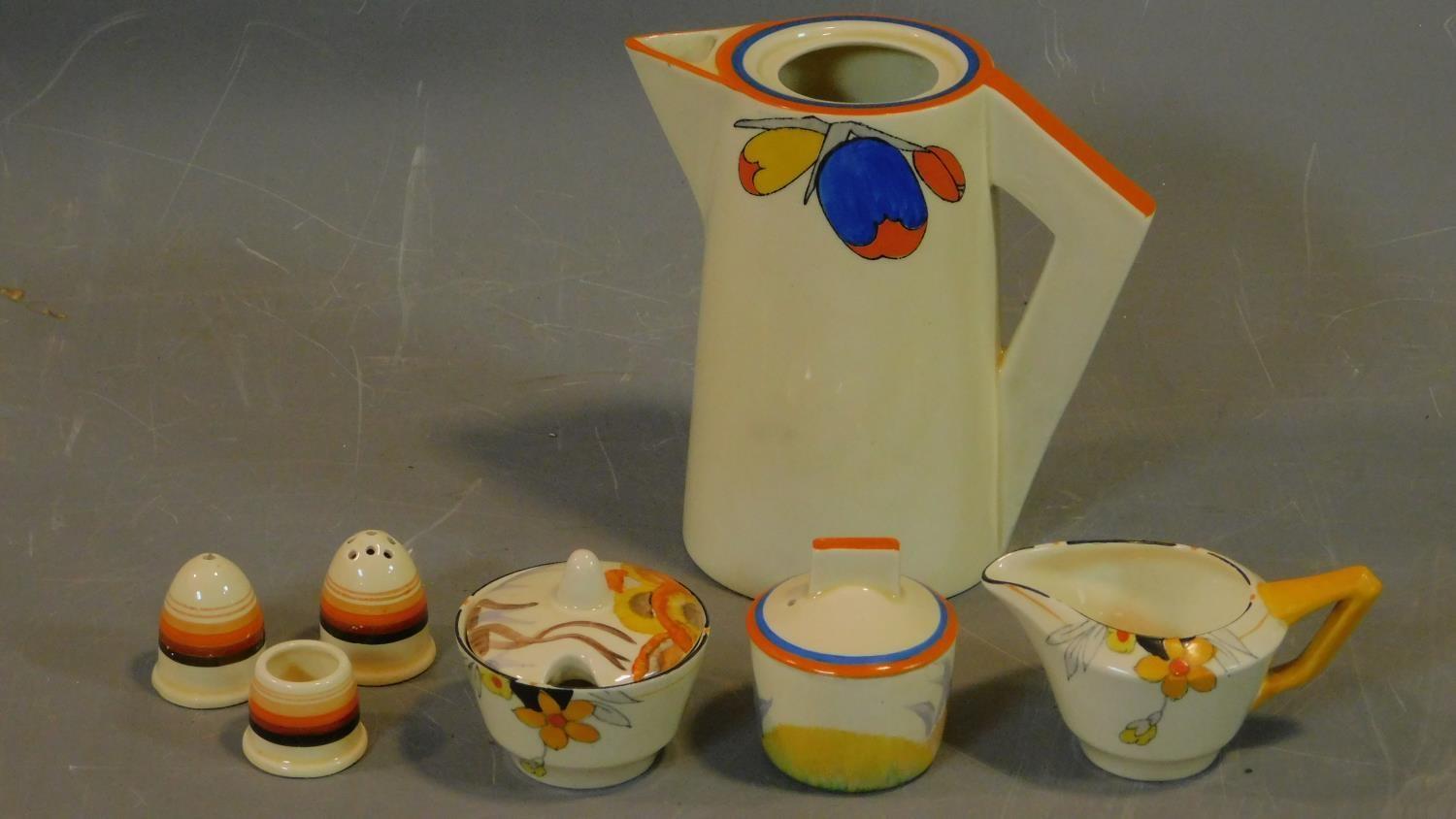 Hand painted ceramics by Clarice Cliff, Bizarre range and Crown Ducal Sunburst range.