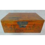 A painted Chinese wooden trunk with figural decoration. H.29 W.76 D.49cm