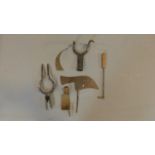 A miscellaneous collection of vintage and antique metal garden tools.