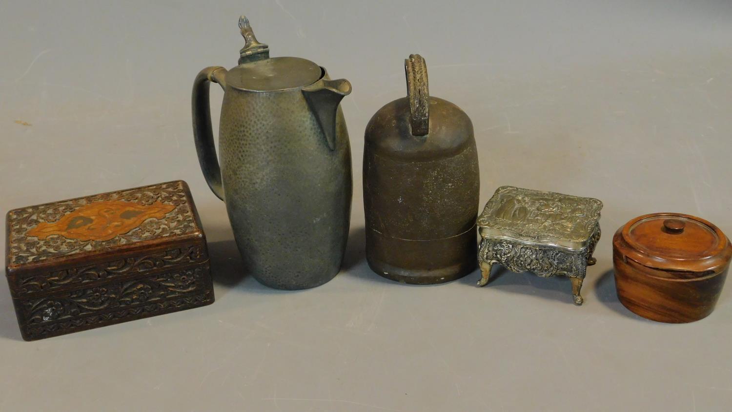 A miscellaneous collection of metal and treen items; boxes, jugs etc