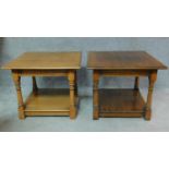 A pair of antique style country oak side tables on turned supports united by undertier. H.50 W.61