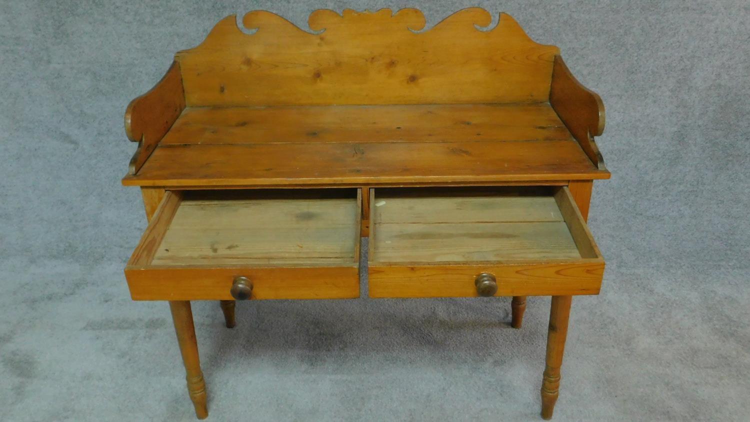 A Victorian pine washstand with raised shaped back and two frieze drawers on turned tapering - Image 2 of 6