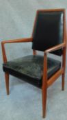 A mid 20th century Danish teak armchair upholstered in leather. H.97cm