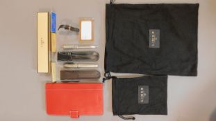 A collection of Links of London items, including a fountain pen in leather case, ball point pen,