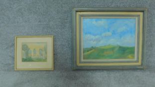 A framed oil on board of a landscape and watercolour of church ruins. Both signed. H.52cm W.62cm