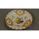 A Meissen handpainted and gilded fruit plate, with central cartouche depicting a lemon, plum,