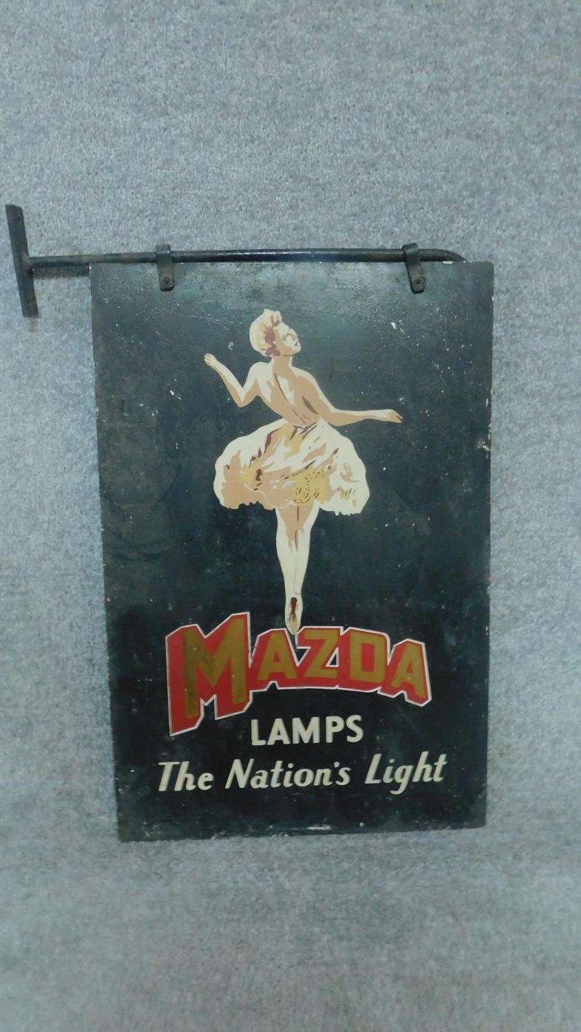 A vintage Mazda light bulb enamel sign, double sided with original hanging fixtures. H.62cm W.41cm