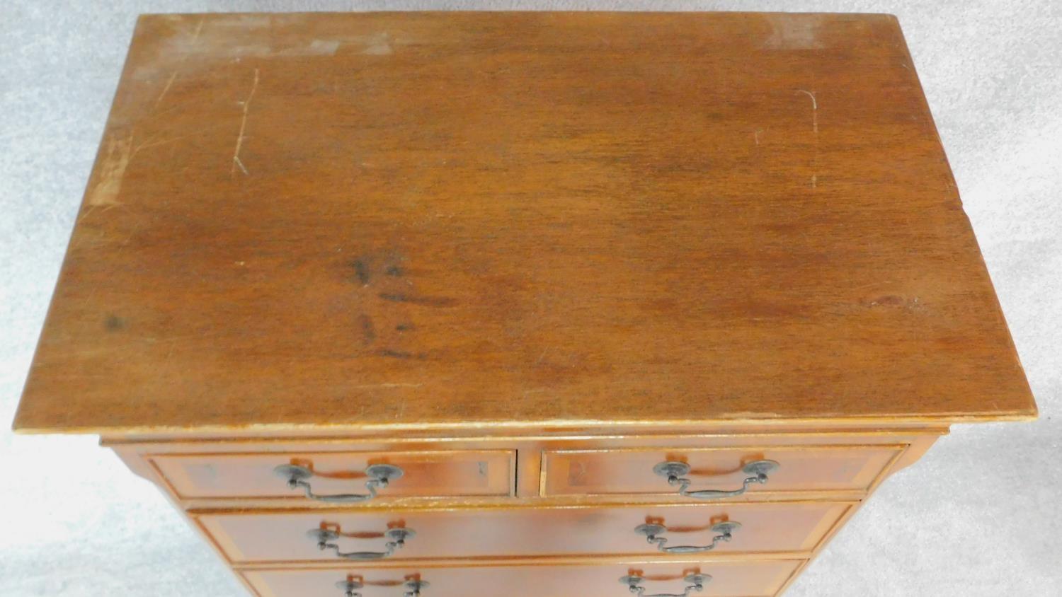 A Georgian style yew chest on chest with two short and six long drawers fitted brushing slide. H.174 - Image 6 of 7