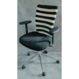 A Vitra swivel adjustable office desk chair on chromium castered base H.101cm