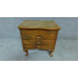 A small Eastern teak sewing chest with hinged lift up lid. H. 49cm W. 49cm D. 37cm