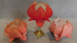 A vintage brass table lamp with lotus shade and two similar shades. H.45