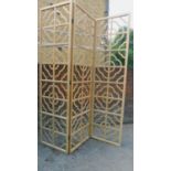 A large oriental style hardwood three panel screen or room divider with pierced decoration H.280cm