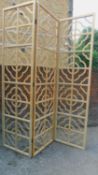 A large oriental style hardwood three panel screen or room divider with pierced decoration H.280cm