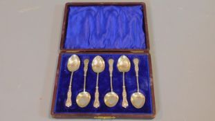 Six silver coffee spoons in case, with embossed and twisted handles, fully hallmarked: Birmingham,