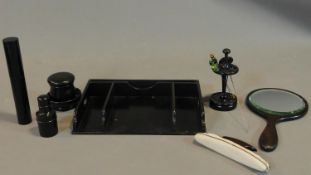 A collection of 19th century turned ebony dressing table pieces.