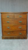 A Victorian walnut chest of 2 short over three long drawers fitted original brass handles. H.118 W.