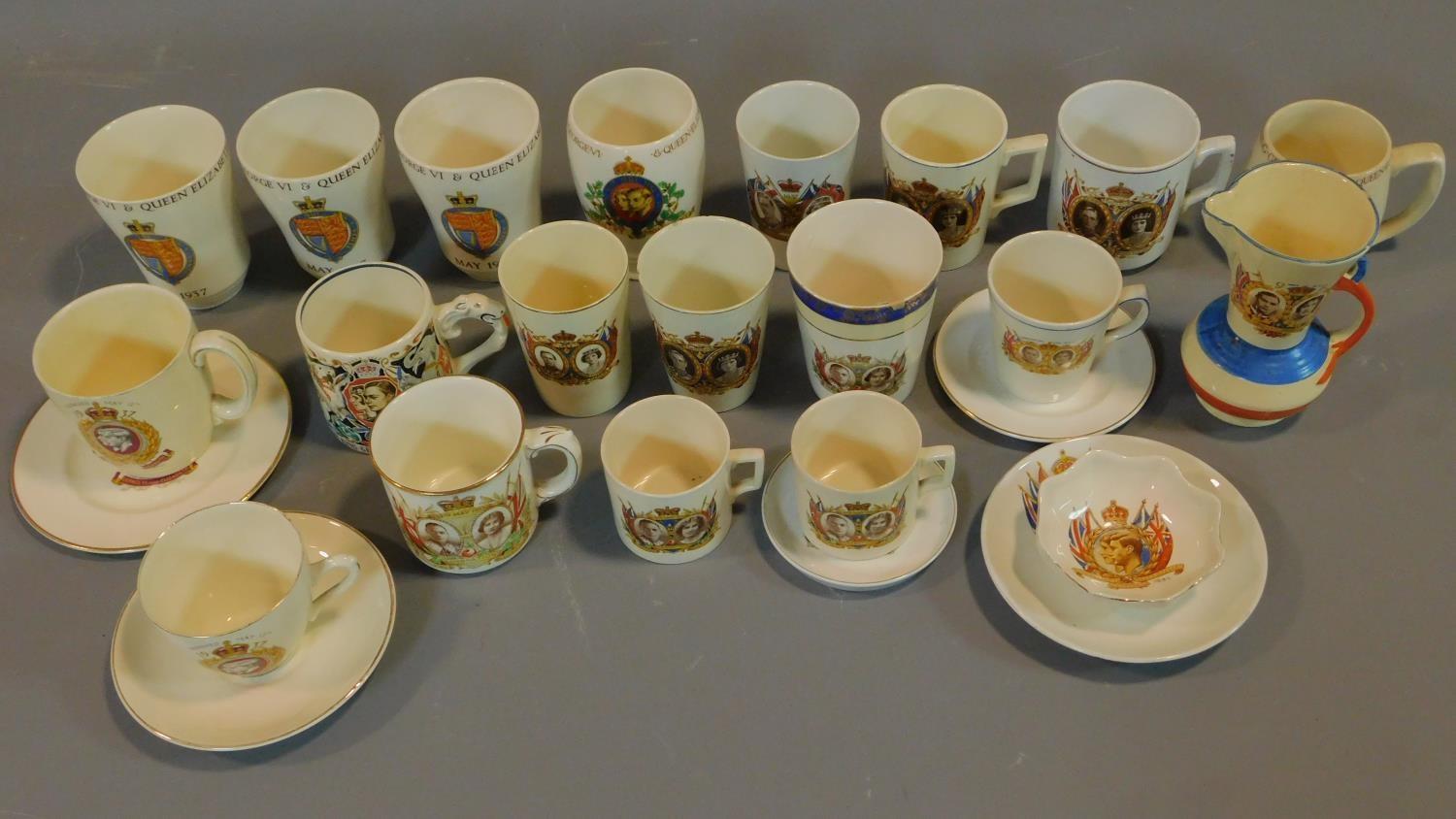 A collection of Royal commemorative mugs for George and Elizabeth