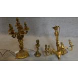 A Rococo style chandelier, a similar six branch table candelabra and a single similar table lamp.