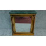 A 19th century Empire style rosewood pier cabinet, the original central plate glass flanked by reed