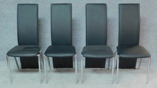 A set of four chrome framed high backed dining chairs. H.101cm