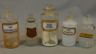A collection of five various glass chemist's jars with ground glass stoppers. H.24cm (tallest)