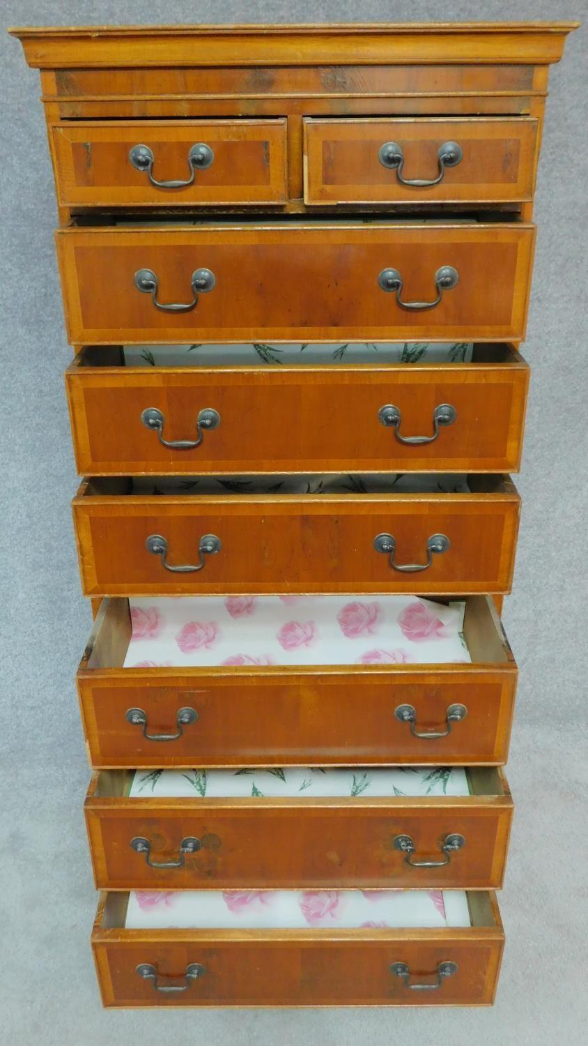 A Georgian style yew chest on chest with two short and six long drawers fitted brushing slide. H.174 - Image 3 of 7