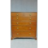 A Regency mahogany chest of two short over three long drawers fitted brass handles on bracket