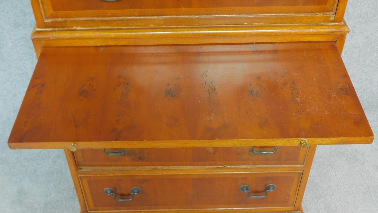 A Georgian style yew chest on chest with two short and six long drawers fitted brushing slide. H.174 - Image 4 of 7