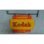 A vintage Kodak cameras hanging enamel sign. Double sided with original hanging fixtures. H.56cm W.