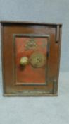 An antique metal safe by Hamilton and a Co. Makers to The Royal Mint, Eccentric lever lock, with