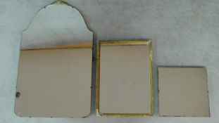 A miscellaneous collection of three vintage wall mirrors, one with makers label. 79x48 (largest)