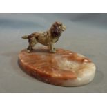 An Austrian cold painted spaniel and marble ashtray