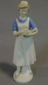 A GDR german porcelain figure of a nurse by Grafenthal H.24cm