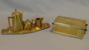 An Arts and Crafts brass German coffee set together with a brass box, coffee pot stamped to base