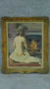 A framed oil on board of a nude woman sitting on a bed in front of a fire in a gilded frame.