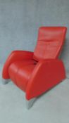 A De Sede red leather reclining armchair with motor action. H.100 W.76cm