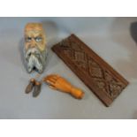 Collection of antique wooden items including, a wooden hand with articulated joints, a painted