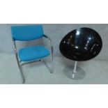 A Vitra chrome framed armchair and a smoked charcoal moulded tub swivel chair by Kartell, stamped to