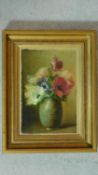 A gilt framed oil on board, still life flowers. 38x29cm