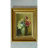 A gilt framed oil on board, still life flowers. 38x29cm