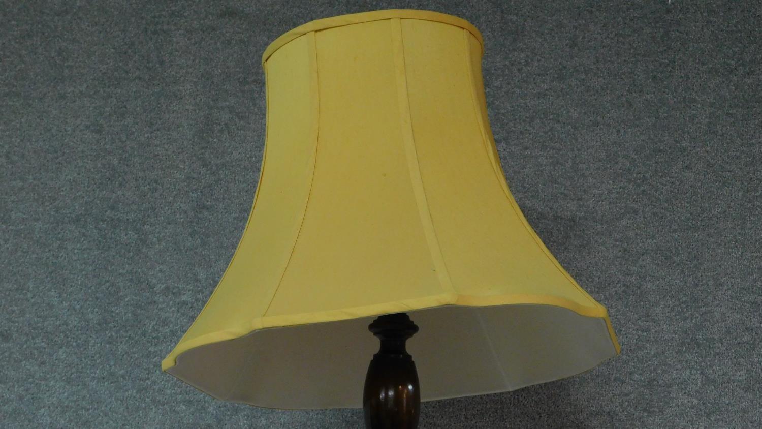 A mid 20th century teak standard lamp with lemon shade. H.180 - Image 2 of 5